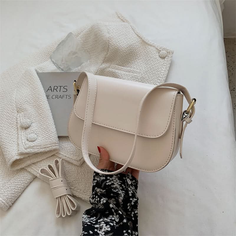 Bolso de hombro marrón clásico, elegante, práctico y atemporal para mujer.