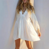 Vestido corto de mujer – Corte fluido – Tejido ligero – Mangas largas – Cuello en pico