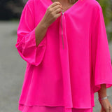 Blusa de mujer – Cuello en V con cremallera – Corte holgado – Mangas 3/4 – Tejido ligero y fluido
