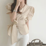 Kasi - Blusa elegante con mangas abullonadas