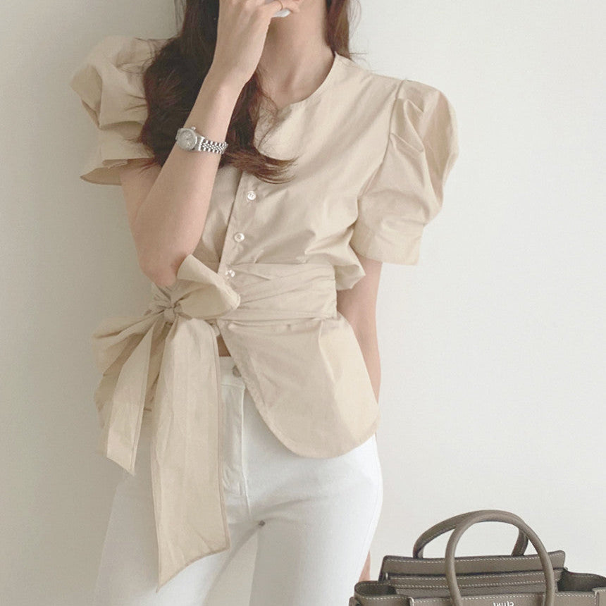 Kasi - Blusa elegante con mangas abullonadas