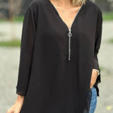 Blusa de mujer – Cuello en V con cremallera – Corte holgado – Mangas 3/4 – Tejido ligero y fluido