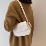 Bolso de hombro marrón clásico, elegante, práctico y atemporal para mujer.