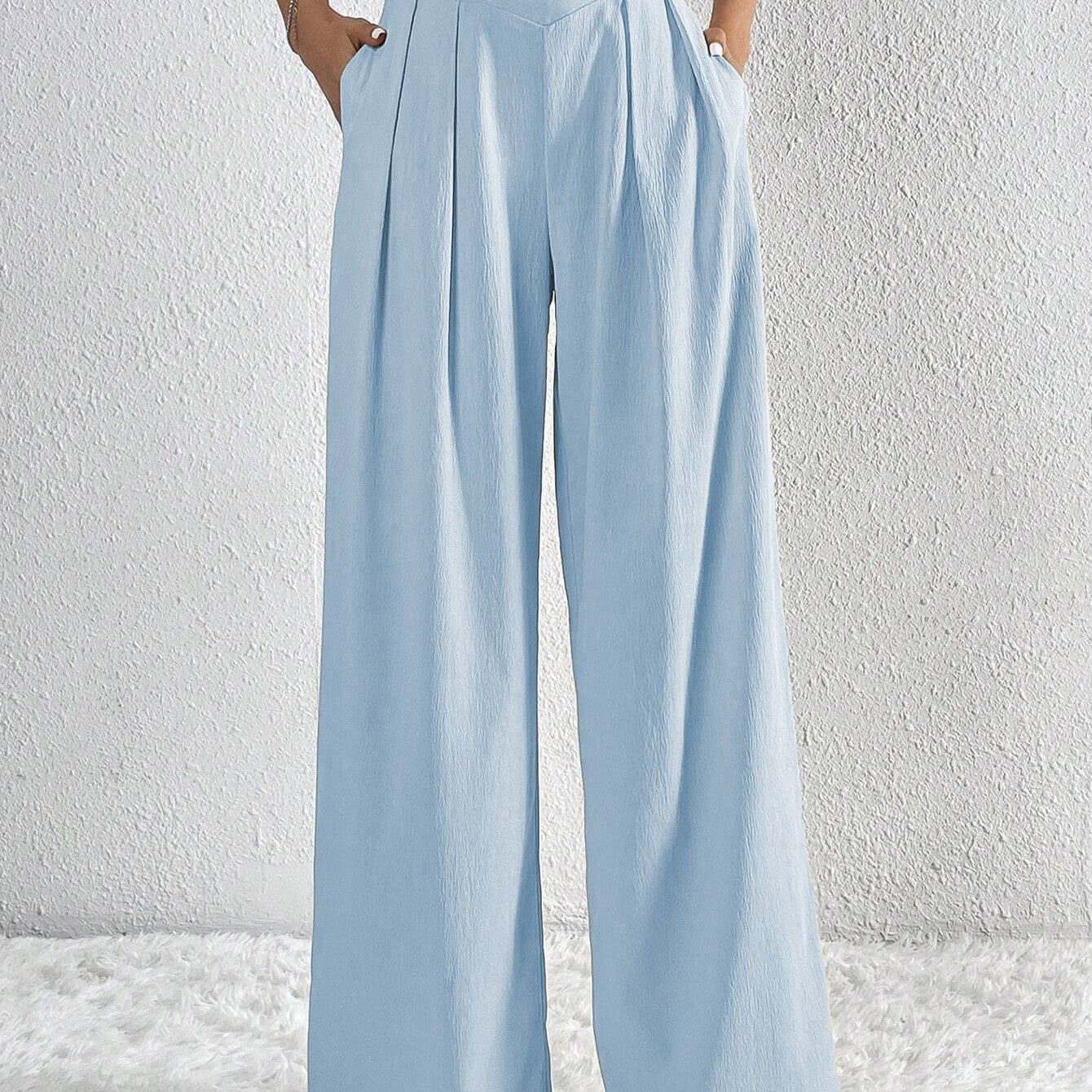 Pantalón ancho de mujer – Cintura alta – Tejido ligero – Corte fluido con pliegues y bolsillos