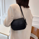 Bolso de hombro marrón clásico, elegante, práctico y atemporal para mujer.