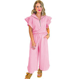 Conjunto informal para mujer: Top con cuello camisero y volantes con cremallera y pantalón ancho con cordón.