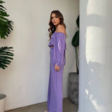 Conjunto de dos piezas para mujer: Top con hombros descubiertos, mangas largas y pantalones anchos de cintura alta.