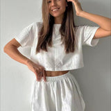 Conjunto de dos piezas para mujer: top corto y shorts, tejido transpirable, corte holgado.
