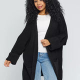 Cárdigan de mujer – Corte oversize – Punto acanalado grueso – Bolsillos delanteros – Frente abierto