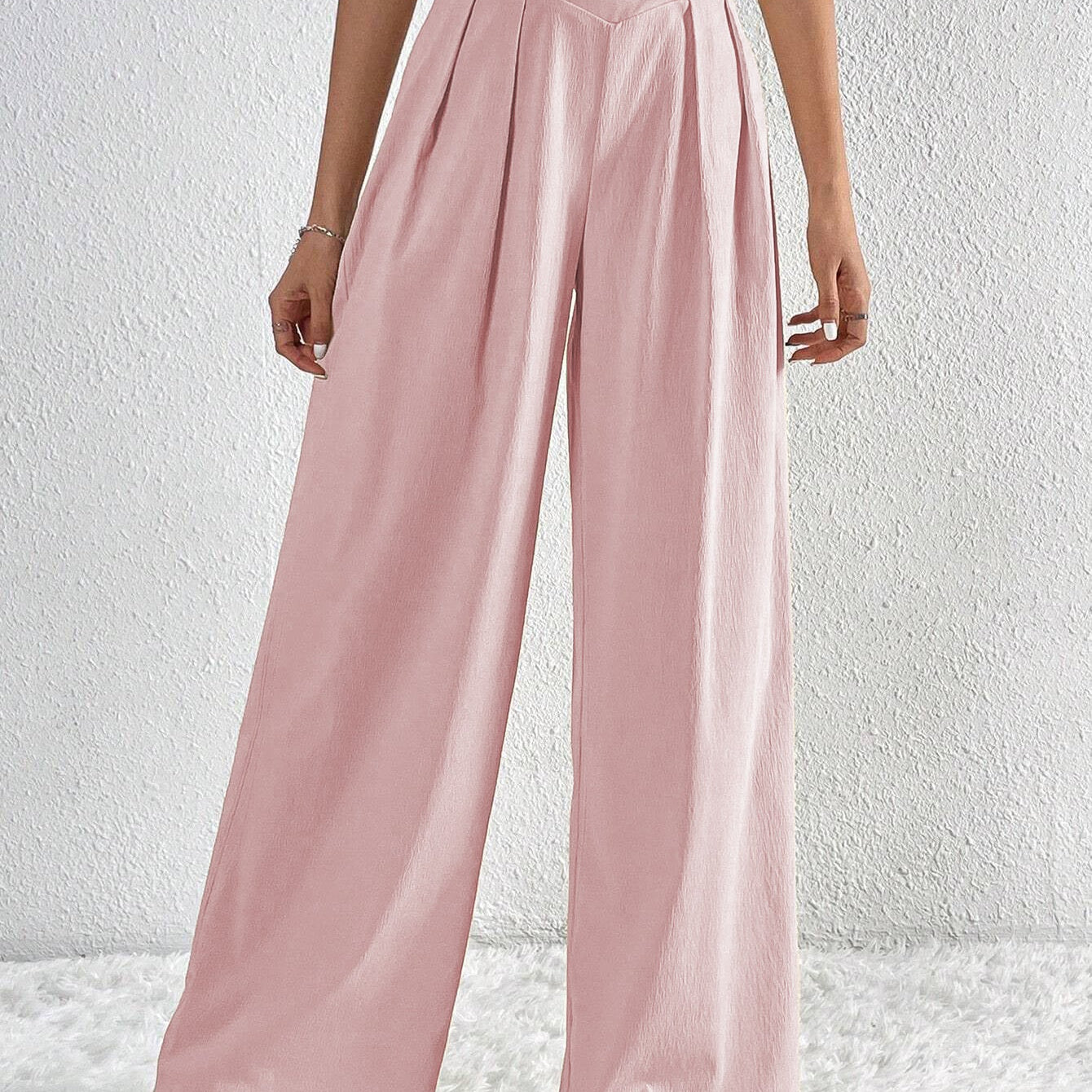 Pantalón ancho de mujer – Cintura alta – Tejido ligero – Corte fluido con pliegues y bolsillos