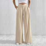 Pantalón ancho de mujer – Cintura alta – Tejido ligero – Corte fluido con pliegues y bolsillos