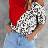 Camiseta de mujer – Corte holgado – Hombros descubiertos – Estampado animal asimétrico