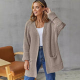 Cárdigan de mujer – Punto grueso – Corte oversize – Cuello en pico – Mangas largas – Bolsillos