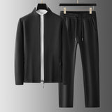 Chándal de hombre – Corte holgado – Chaqueta con cremallera y cuello alto – Pantalón con cintura elástica