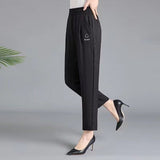 Pantalones de mujer – Corte relajado – Cintura elástica – Bolsillos