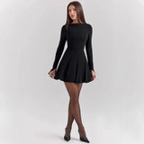 Vestido de manga larga para mujer, corte ajustado, falda acampanada y diseño elegante y estructurado.
