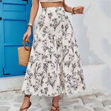 Falda midi para mujer – Corte fluido y acampanado – Cintura elástica – Tejido floral ligero
