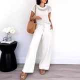 Conjunto de mujer: Top de malla de manga corta y pantalón ancho y fluido