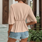 Blusa de mujer – Corte relajado – Lazo delantero – Mangas anchas hasta el codo – Cuello en pico