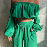 Conjunto de dos piezas para mujer: Top con hombros descubiertos, mangas largas y pantalones anchos de cintura alta.