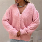 Cárdigan de mujer – Corte oversize – Punto esponjoso – Cuello en pico – Mangas largas abotonadas