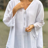 Blusa de mujer – Cuello en V con cremallera – Corte holgado – Mangas 3/4 – Tejido ligero y fluido