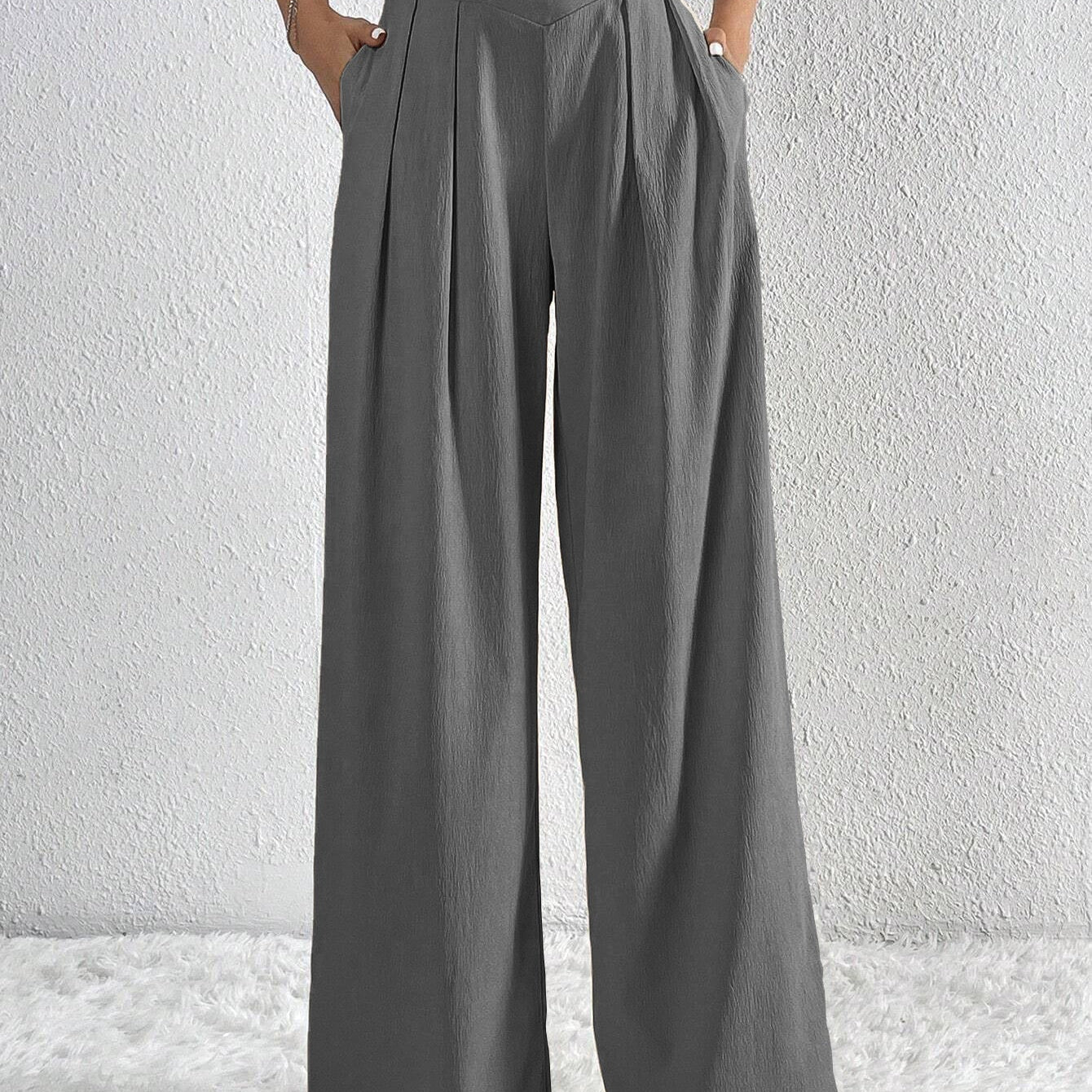 Pantalón ancho de mujer – Cintura alta – Tejido ligero – Corte fluido con pliegues y bolsillos