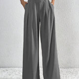 Pantalón ancho de mujer – Cintura alta – Tejido ligero – Corte fluido con pliegues y bolsillos