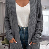 Cárdigan de mujer – Corte oversize – Punto grueso – Punto trenzado – Bolsillos delanteros