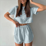 Conjunto de dos piezas para mujer: top corto y shorts, tejido transpirable, corte holgado.