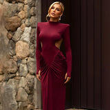 Vestido largo sexy sin espalda y con cuello alto.