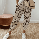 Pantalones de mujer – Corte holgado – Cintura con cordón – Estampado abstracto – Tejido ligero