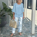 Conjunto de dos piezas para mujer: tejido transpirable, top holgado y pantalón estampado fluido.