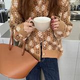 Cárdigan de punto elegante, cómodo y floral para mujer.