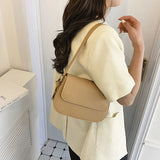 Bolso de hombro marrón clásico, elegante, práctico y atemporal para mujer.