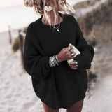 Suéter de mujer – Punto grueso – Corte holgado – Cuello redondo – Ribete de canalé