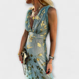 Vestido con escote en V y detalles de brillo