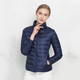 Chaqueta acolchada para mujer – Chaqueta ligera de plumón – Corte entallado – Cuello alto con cremallera