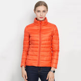 Chaqueta acolchada para mujer – Chaqueta ligera de plumón – Corte entallado – Cuello alto con cremallera
