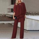Conjunto de dos piezas para mujer: Top asimétrico fluido y pantalón ancho elegante.