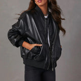 Chaqueta de mujer – Corte oversize – Acabado brillante – Bordes acanalados – Cremallera frontal