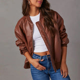 Chaqueta de mujer – Corte oversize – Acabado brillante – Bordes acanalados – Cremallera frontal