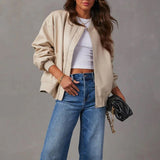 Chaqueta de mujer – Corte oversize – Acabado brillante – Bordes acanalados – Cremallera frontal