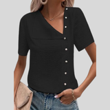 Nora - Elegante blusa de diseño con tapeta y cierre de botones.