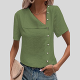 Nora - Elegante blusa de diseño con tapeta y cierre de botones.