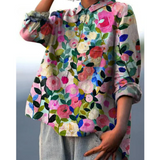 Blusa de mujer – Corte holgado – Fibras naturales transpirables – Estampado floral – Mangas largas – Tapeta de botones – Cuello clásico