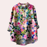 Blusa de mujer – Corte holgado – Fibras naturales transpirables – Estampado floral – Mangas largas – Tapeta de botones – Cuello clásico