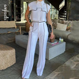 Conjunto de oficina de dos piezas: chaleco con solapas, bolsillos y pantalón en contraste.