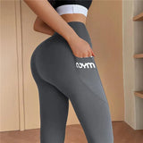 Leggings deportivos largos para mujer: cintura alta, elásticos y transpirables.