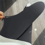 Leggings deportivos largos para mujer: cintura alta, elásticos y transpirables.